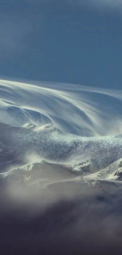 Serene snowy mountain under a blue sky with misty peaks and crisp snow.