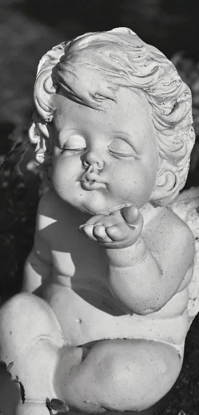 Monochrome wallpaper featuring a serene stone angel statue.