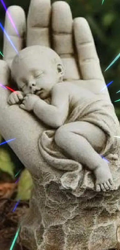 Stone sculpture of a baby cradled in a hand against a green background.