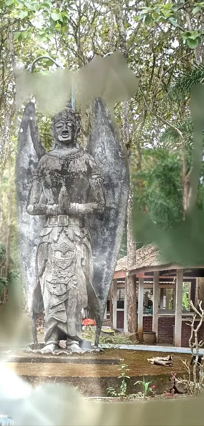 Stone statue surrounded by lush greenery.