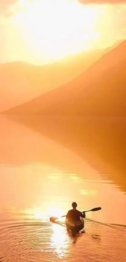 Kayaker at sunrise on calm waters, surrounded by warm orange hues.