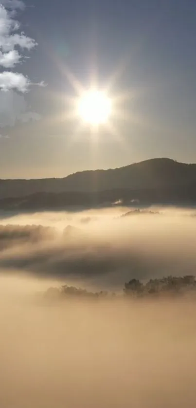 Serene sunrise over misty mountain landscape with golden hues.