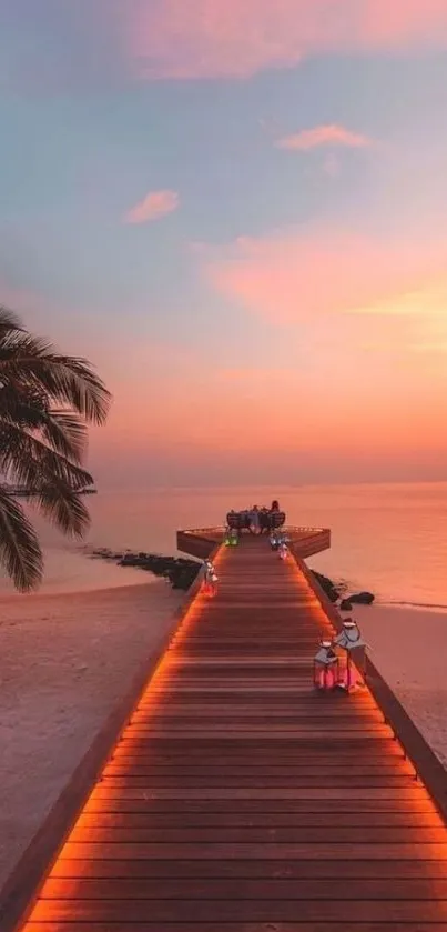 Tranquil sunset beach pathway with glowing lights.