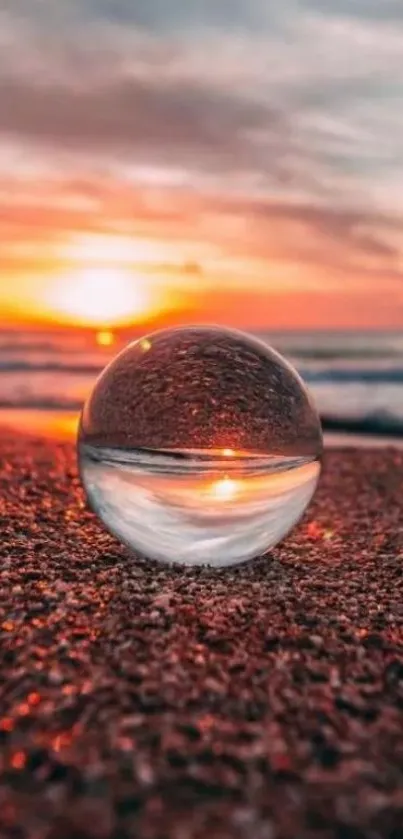 Serene sunset at the beach through a crystal sphere.