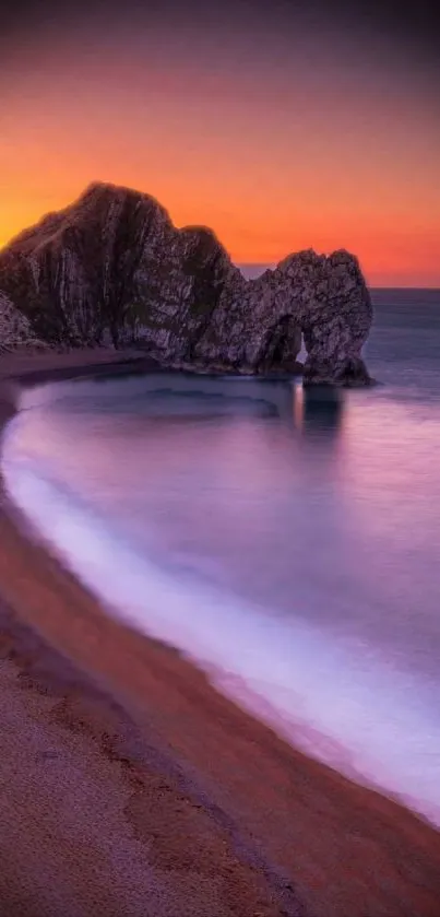 Sunset over a tranquil beach with vibrant colors and serene landscape.