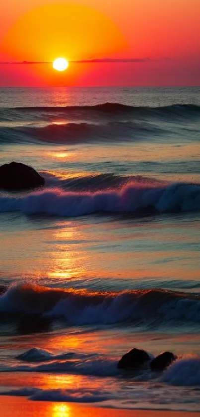 Serene beach with sunset and vibrant ocean waves.