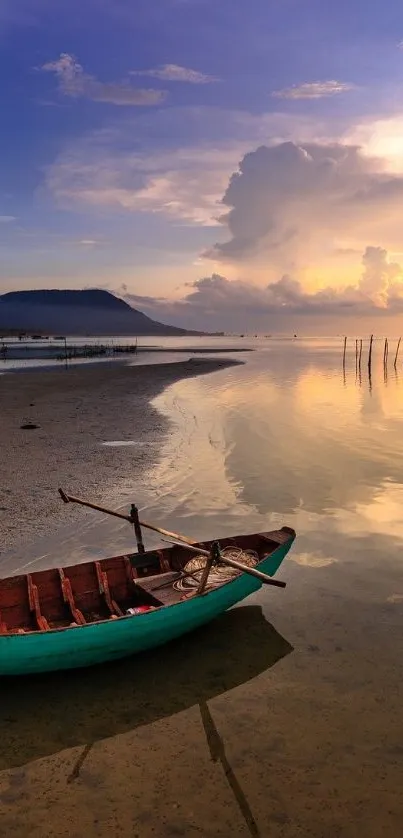 Wooden boat on serene sunset beach with golden reflections.