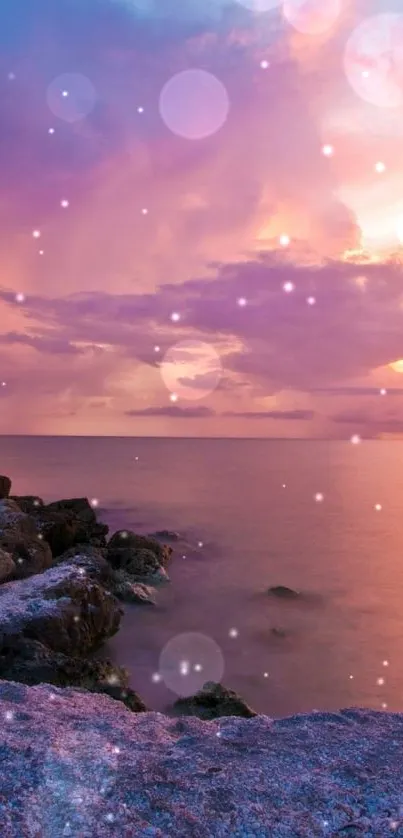 A serene sunset over a rocky beach with purple and pink skies, captured beautifully.