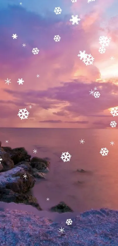 Serene sunset beach wallpaper with snowflakes.