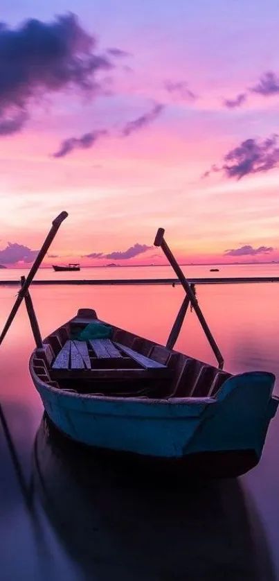 Peaceful boat at sunset with a purple sky reflecting on calm waters.