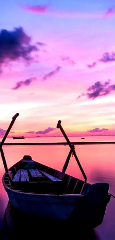 Serene sunset moment with a boat on calm waters, reflecting vibrant twilight colors.