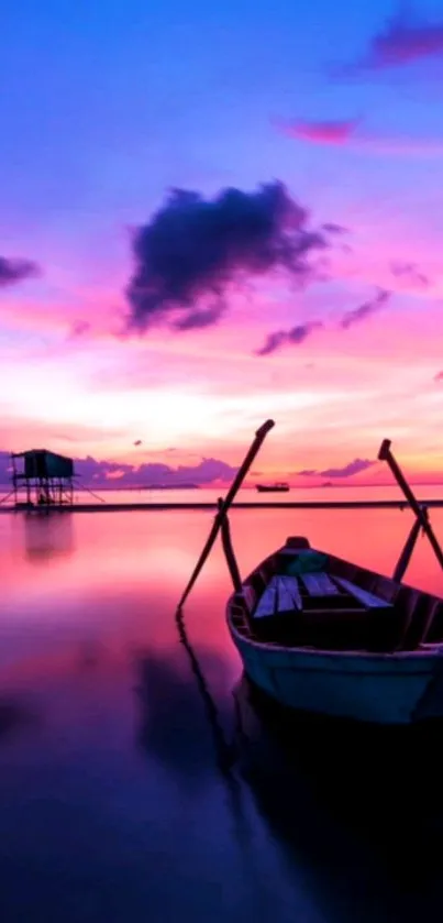 A tranquil sunset over a calm lake with a boat in the foreground.