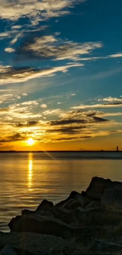 Beautiful sunset over a tranquil lake with vibrant sky.