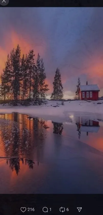 Cabin by a snowy lake at sunset with a serene reflection.