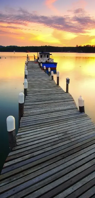 Peaceful dock extends into a vibrant sunset over tranquil waters.