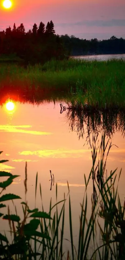 Serene sunset with vibrant colors reflecting on a tranquil lake.