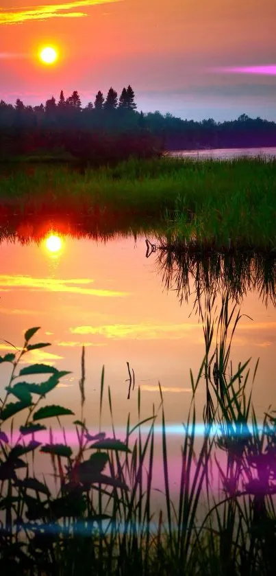 Serene sunset over a calm lake with orange and red reflections.