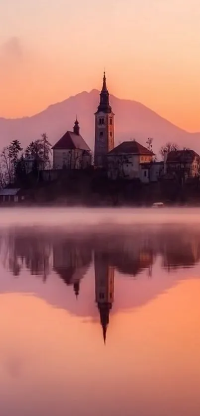 Serene sunset over a reflective lake with a church silhouette.