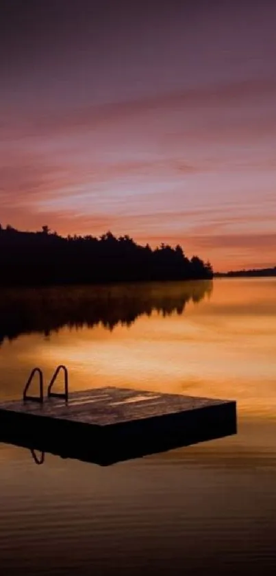 Calming sunset over a serene lake with a dock silhouette.