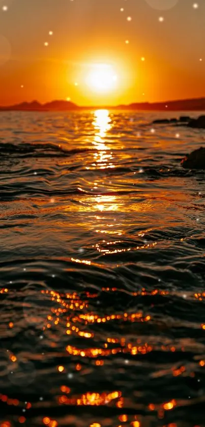 Sunset over ocean with glowing colors and tranquil scenery.