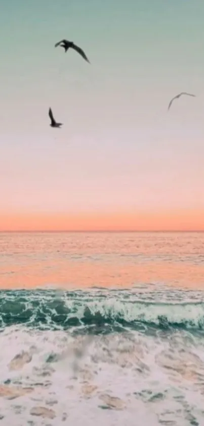 Ocean with birds flying at sunset under a pastel sky.