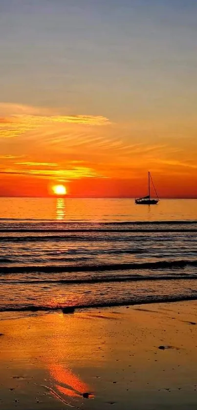 Sailing boat during a stunning ocean sunset.