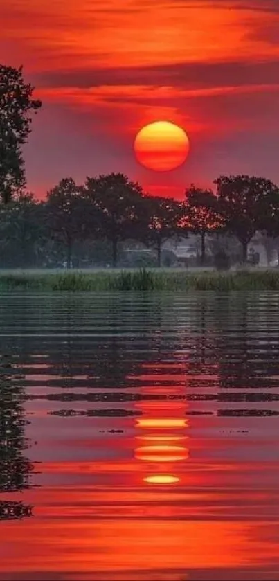 A vibrant sunset with reflections over a tranquil lake.