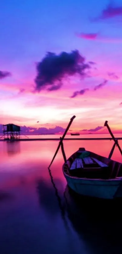 Scenic sunset over calm sea with pink sky and a small boat.