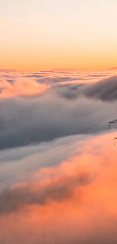 Serene sunset over clouds with power tower.