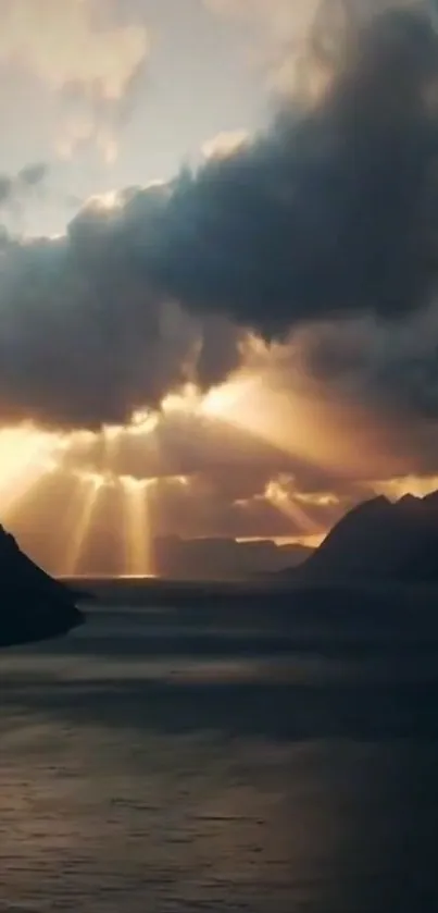 Dramatic sunset over ocean with clouds and sun rays.