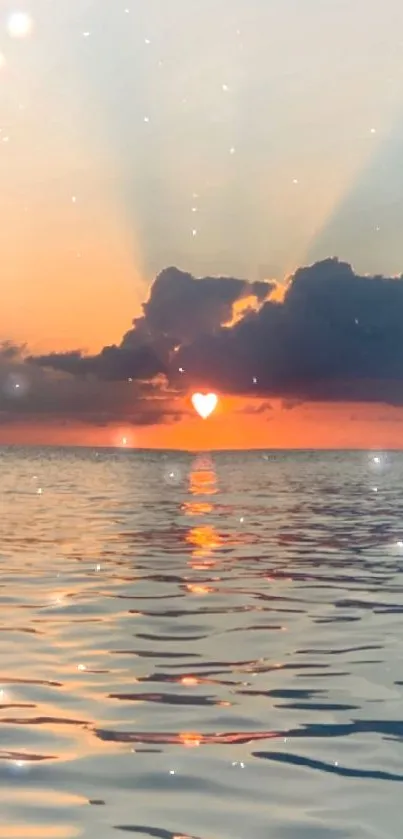 Beautiful ocean sunset with clouds and heart over horizon.