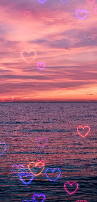 A serene sunset over the ocean with vibrant pink and purple hues.