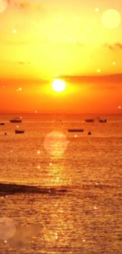 A golden sunset over a tranquil ocean with boats and soft glowing lights.