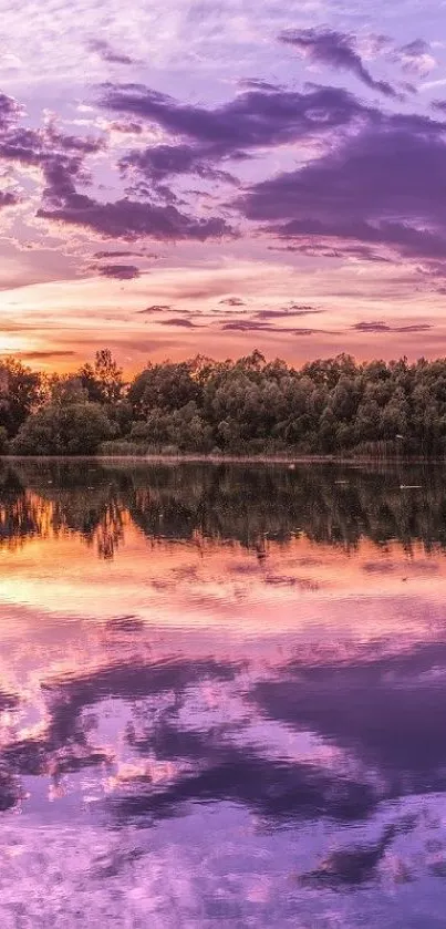 Purple and orange sunset reflecting on calm lake at twilight.