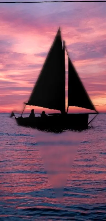 Silhouette of sailboat at sunset on a tranquil ocean.