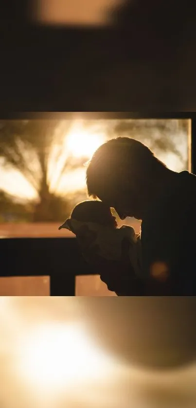 Father and child silhouette at sunset.