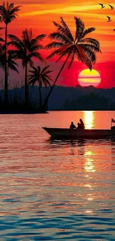 Sunset over water with palm trees silhouetted against vibrant orange sky.