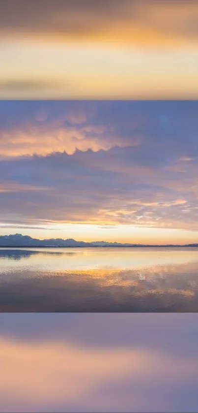 Serene sunset with sky reflecting on calm lake.