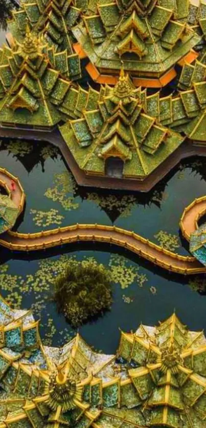 Aerial view of Asian temple with green rooftops reflected in water, creating a serene scene.