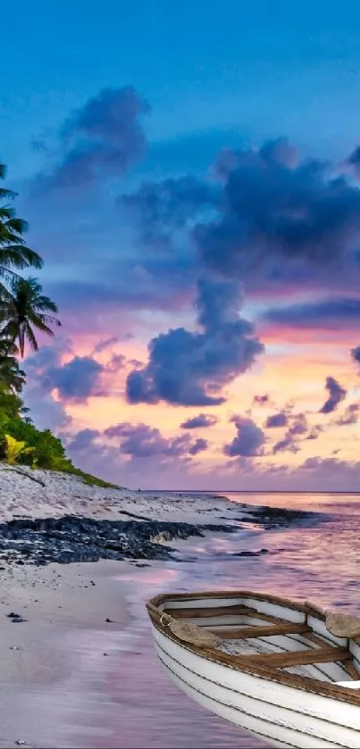 Tropical beach at sunset with calm waters and vibrant sky colors.