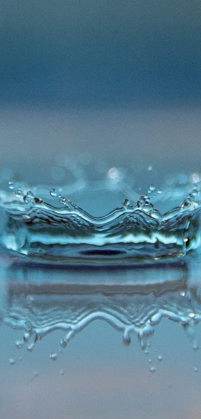 Close-up of a blue water droplet splash creating ripples.