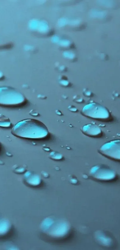 Close-up of blue water droplets on a surface, creating an abstract mobile wallpaper.