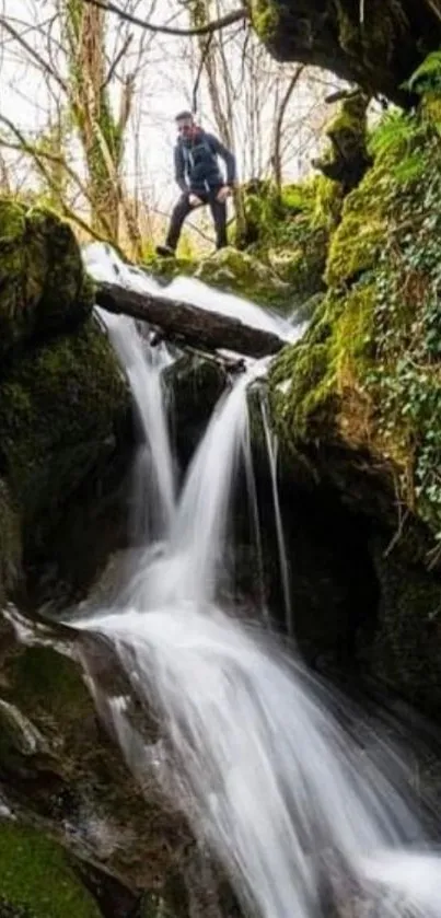 Adventurer above green waterfall landscape