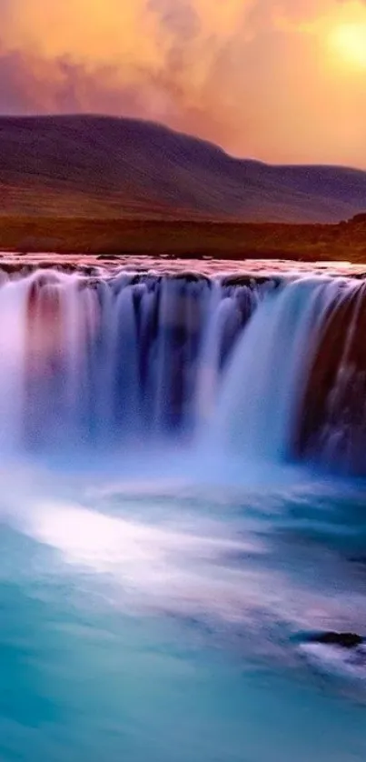 Beautiful waterfall at sunset with vibrant sky colors.