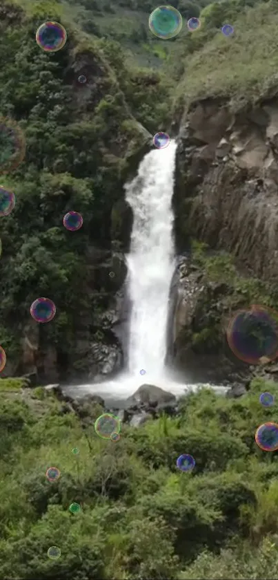 Waterfall with bubbles in lush green setting.