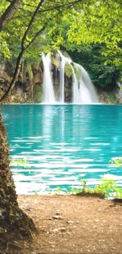 Mobile wallpaper of a serene waterfall with turquoise lake and green trees.