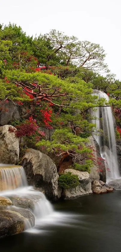 Serene garden scene with waterfalls and vibrant flowers.