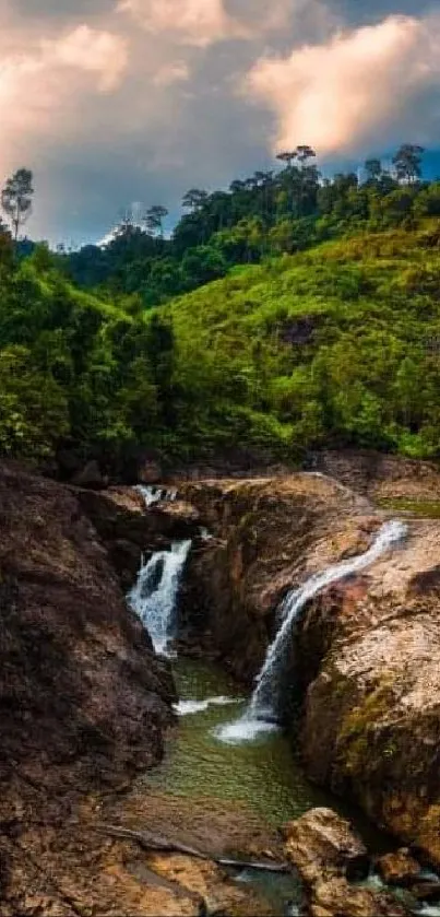 Scenic waterfall in lush green landscape.