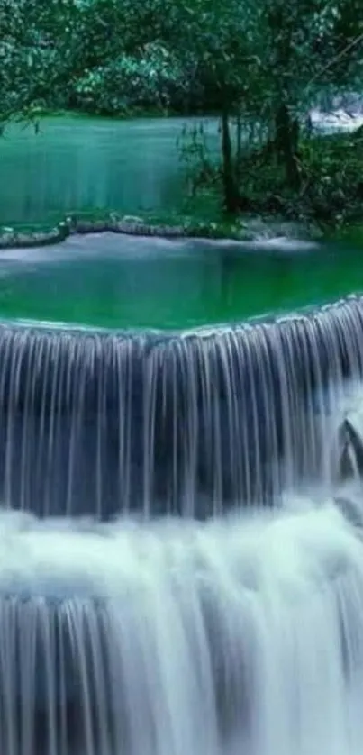 Serene waterfall with vibrant greenery.