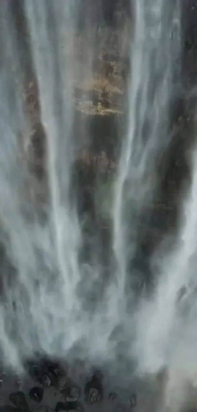 Serene gray waterfall in motion, displaying natural beauty.
